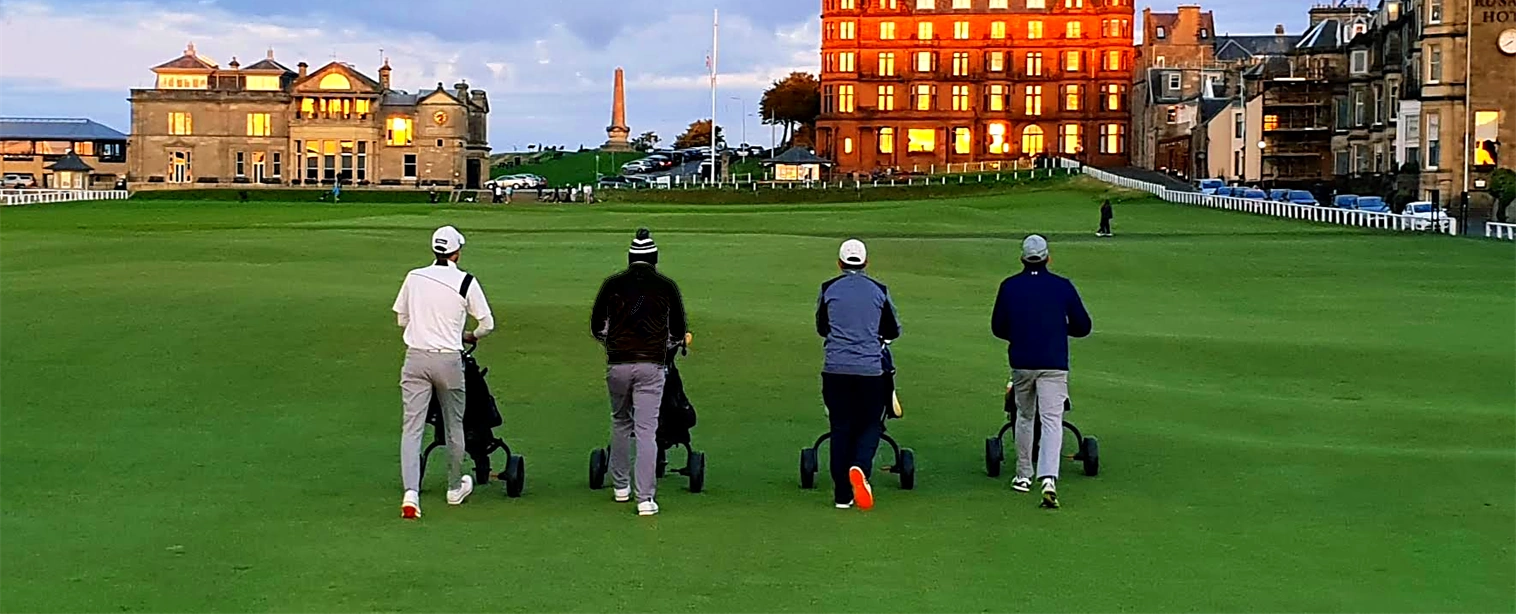 4 golfers walking up the 18th at St Andrews
