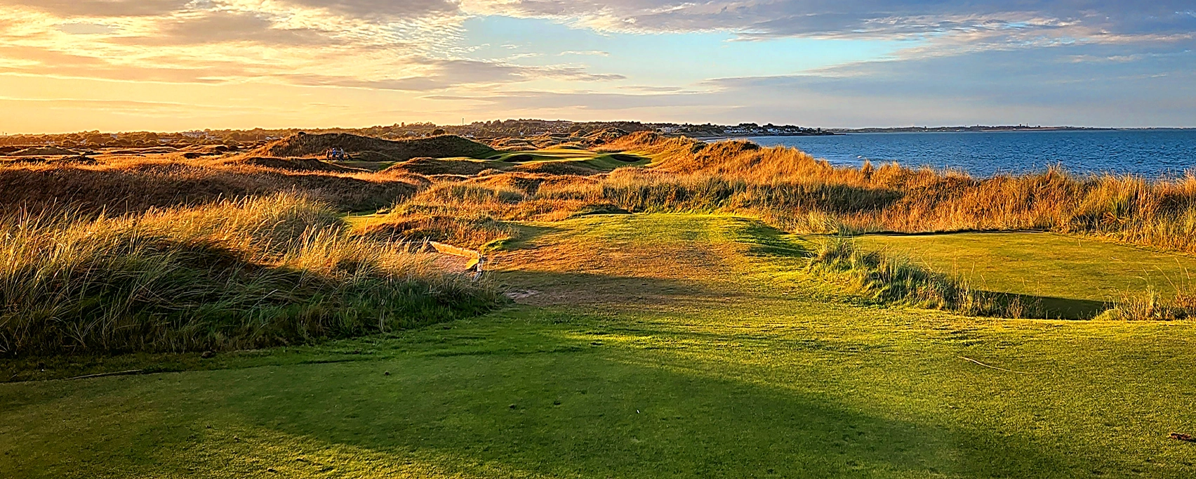 Tee at Portmarnock golf club in evening sunshine