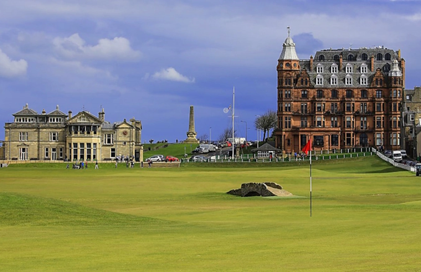 Looking across the 17th green to the 18th tee, the swilcan bridge, 18th fairway and the R&A clubhouse