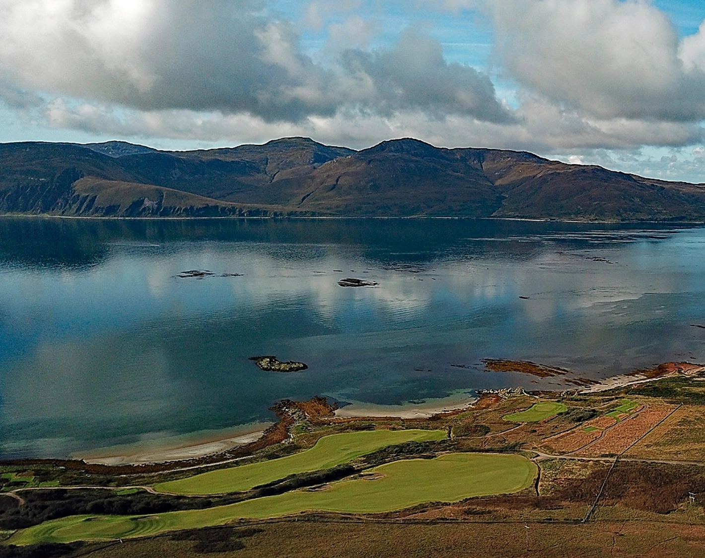 Islay looking across the Sound of Jura with a bit of Ardfin golf course int he foreground