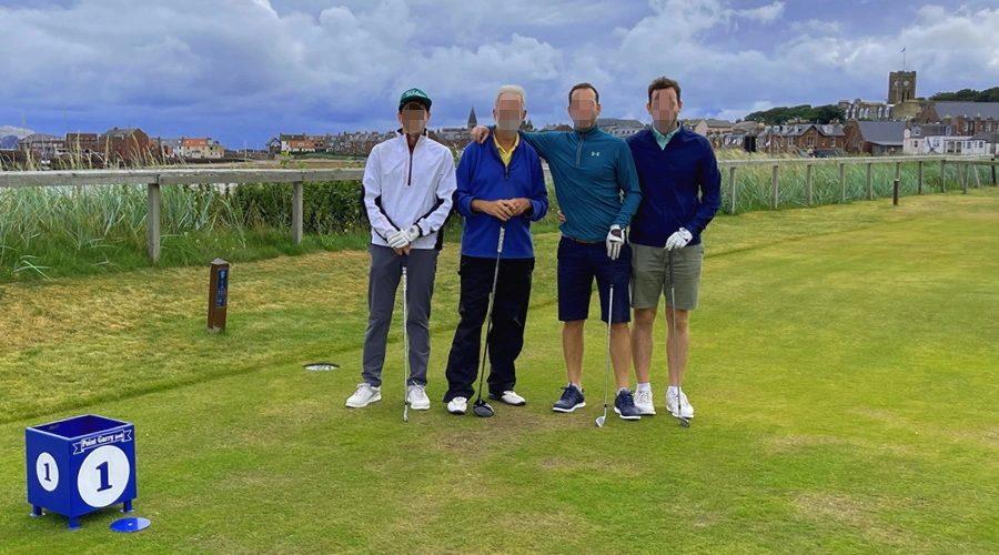 Golfers on the first tee. Might be at Elie