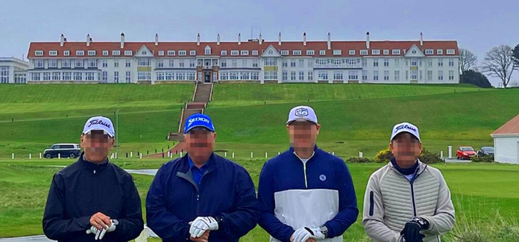 four golfers at Turnberry with hotel in background