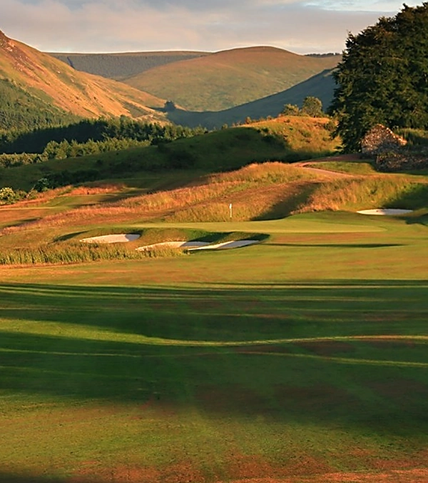 2nd hole on the Gleneagles Centenary Course with orange and brown autumn hues on the hillsides